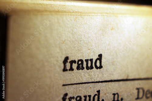 Canvas Print Word fraud printed on dictionary page, macro close up