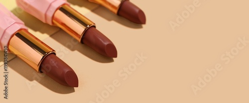Beautiful lipsticks on beig...