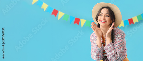 Young happy woman in straw ...