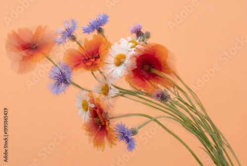 Artistic red poppies and wildflower bouquet with soft motion blur effect