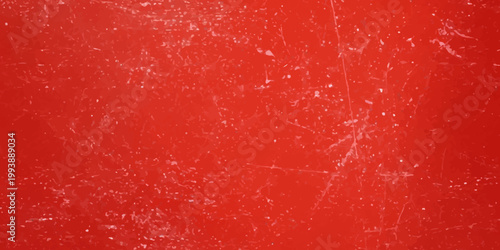 Red grunge painted wall texture with rough vintage pattern in warm red and orange tones