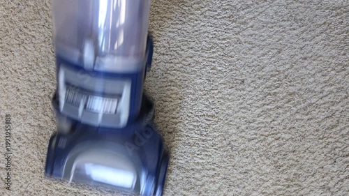 Carpet Being Vacuumed As Seen From Above