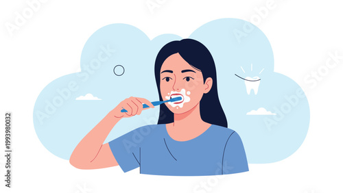 Young woman with long dark hair brushing her teeth with white foam as part of her morning hygiene and dental care routine at home.