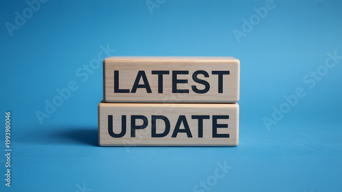 Two wooden blocks with latest update text  