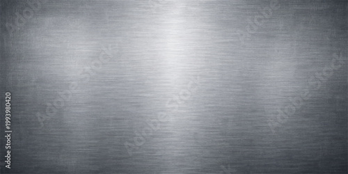 Polished silver brushed metal texture featuring a shiny stainless steel surface with an industrial grey aluminum plate pattern for a metallic backdrop design