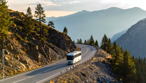 Bus traveling winding mountain road with scenic landscape