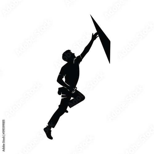 Rock climber reaching for a hold on a challenging steep vertical wall