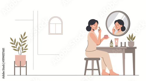 Woman applying makeup at a vanity with round mirror, plants and soft light in a bright interior.