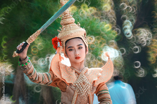 Traditional Thai Dance Drama with Masked Performer Holding Sword