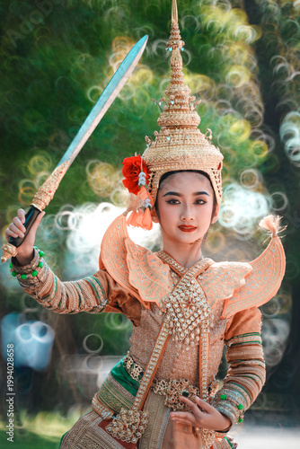 Traditional Thai Masked Dance Drama Performance with Sword in Thailand