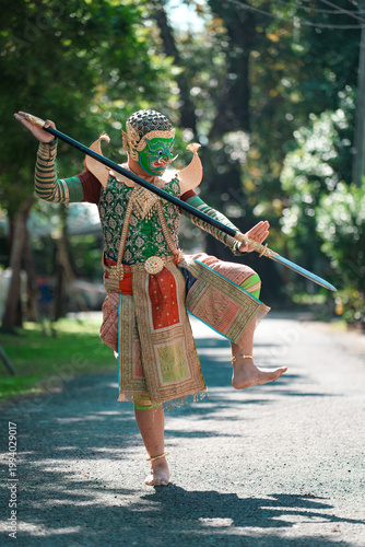 Traditional Masked Dance Performance in Thailand's Scenic Setting