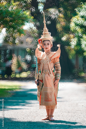 Elegant Traditional Dance Performance in Thailand with Masked Dancer