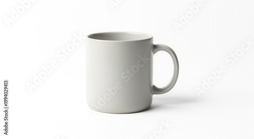 Isolated minimalist ceramic mug on white background, showcasing clean design and modern aesthetic for coffee or tea drinking in studio lighting.