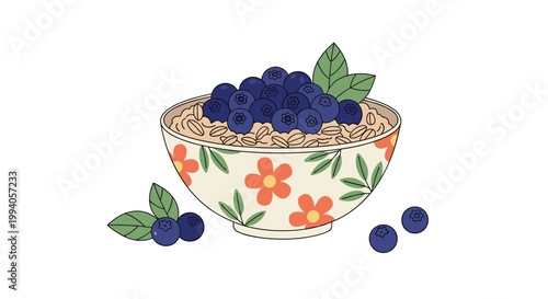 Healthy breakfast bowl filled with warm oatmeal porridge topped with a large pile of fresh ripe blueberries and green mint leaves.