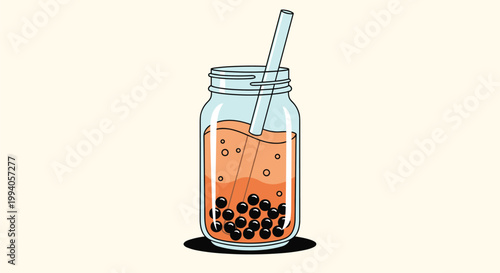 Delicious glass jar of orange bubble tea with black tapioca pearls and a wide straw for a refreshing cold summer beverage.