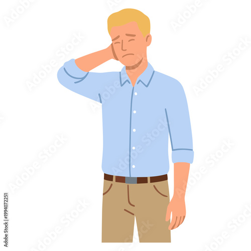 A man is rubbing his head in frustration while standing alone.