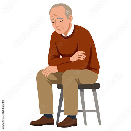 An elderly man sits on a stool with a pained expression holding his stomach.
