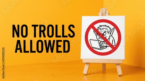 No Trolls Allowed message with a forbidden internet troll on a laptop displayed on a canvas