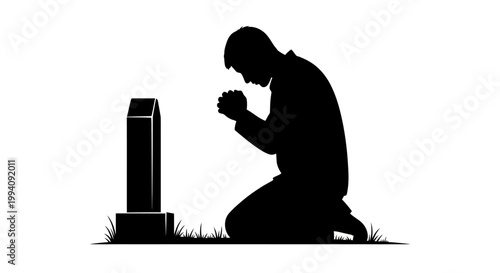 Silhouette of person praying at modern memorial with candlelight reflection at dusk