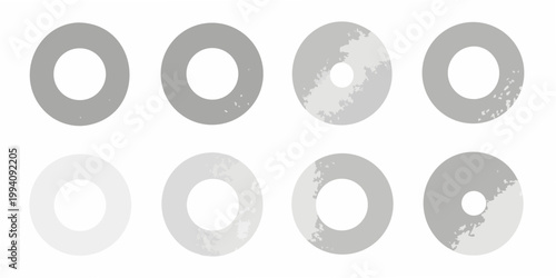 A grid of eight oval shapes with varying shades of gray tones