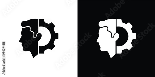 Black and white silhouettes of human head with gear puzzle