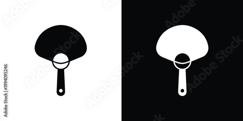 Black and white ping pong paddle on split background symbol