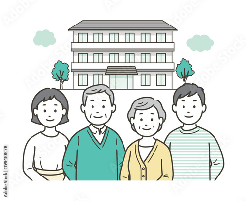 介護施設の前にいる高齢者夫婦と若い夫婦
