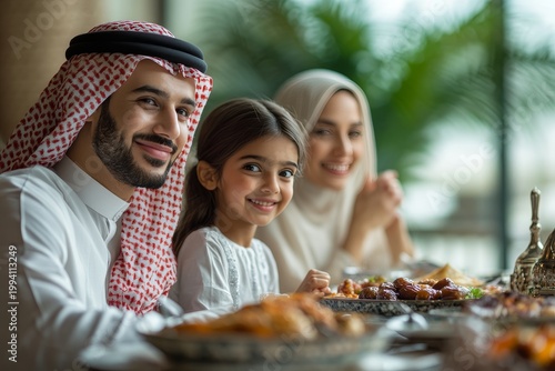 Muslim Family Celebrating Eid al-Fitr with Traditional Food and Joy