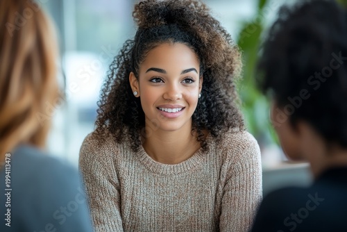 Smiling Young Woman During Interview or Meeting