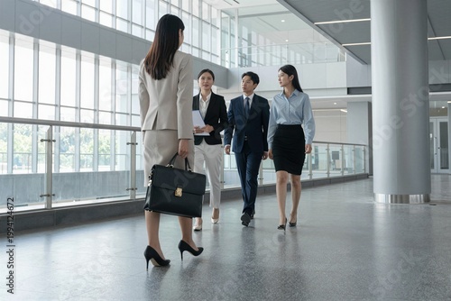 business people walking in airport