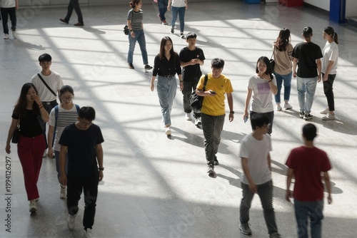 crowd of people walking in the city