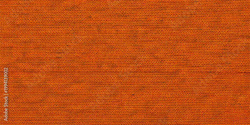 A closeup of vintage orange fabric and red carpet material shows a rough grunge textile surface with a weathered wallpaper pattern and old canvas backdrop structure