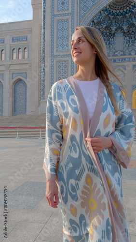 Woman in Uzbek robe at Center of Islamic Civilization Tashkent
