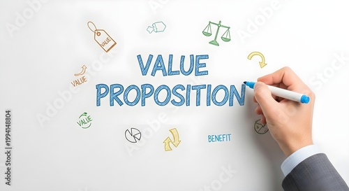 Businessman writing value proposition with blue marker on white board surrounded by various business concept icons and symbols