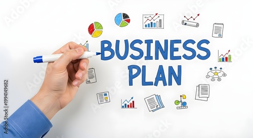 Closeup view of a persons hand holding a blue marker writing the words BUSINESS PLAN surrounded by handdrawn business icons and charts on a white background