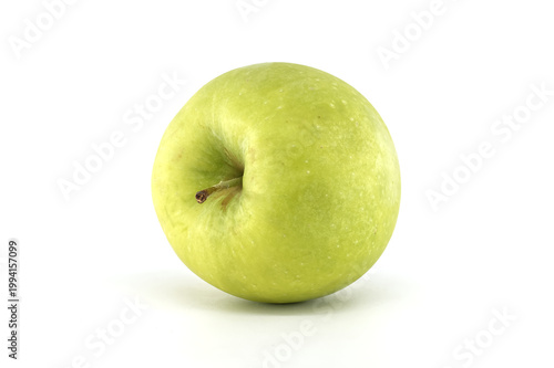 Single green apple with stem on a clean white background, studio shot