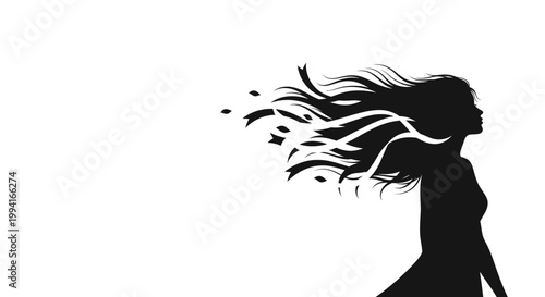 Silhouette of a young woman with long hair flowing in the wind.
