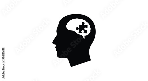 A striking black silhouette of a human head contains a brain image with a missing puzzle piece silhouette