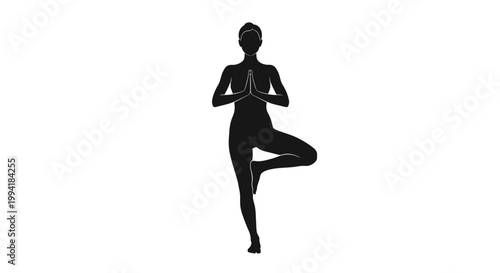 Woman in yoga tree pose silhouette.