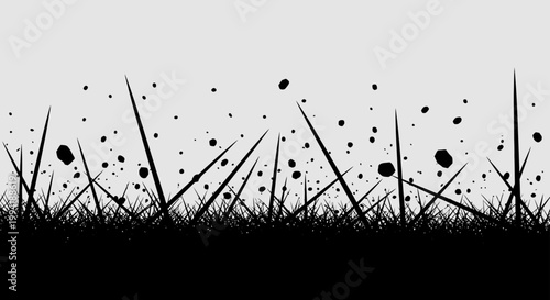 abstract black grass blades and scattered debris against a light grey background a dynamic grunge graphic symbolizing struggle and impact.