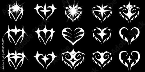 Collection of abstract white tribal style designs on a black background