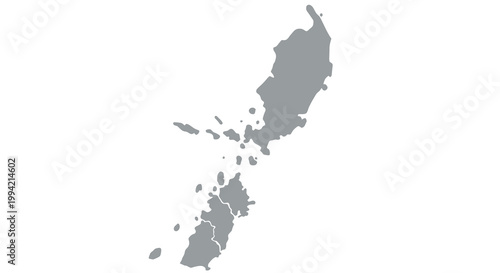 A grayscale silhouette map depicts the island of new guinea showcasing its complex coastline and surrounding islands