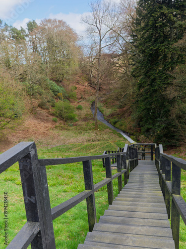 Looking down the wooden steps tproviding access to the Crombie Reservoir Water outlet into the Burn within the Valley Floor.