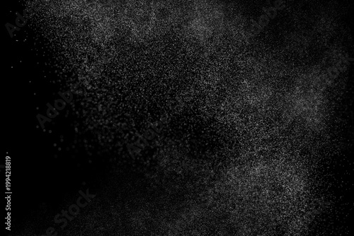 Water spray mist particle abstract black background texture
