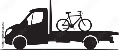 Small truck transporting a road bike on a trailer