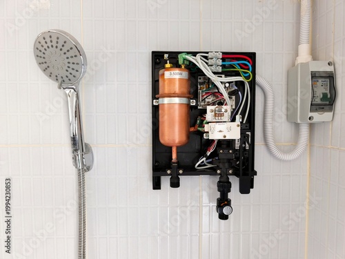 Electronic components and a boiler, installed on the circuit board of a water heater.