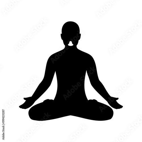Silhouette of a person in lotus position, meditating peacefully with open hands