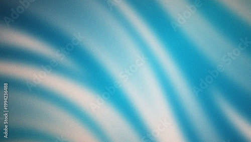 Foto A pattern of curved lines that resembles waves or smooth folds of fabric