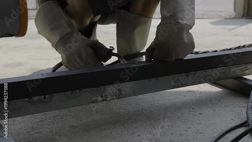 Welder Preparing To Weld Steel Metal Welding Work, A video of a welder gearing up to weld steel, skilled craftsmanship and industrial work, perfect for construction documentary and industrial film.