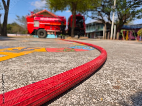 close up details of the hose of the fire truck.